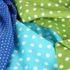 Blauwe en groene polka dot platen